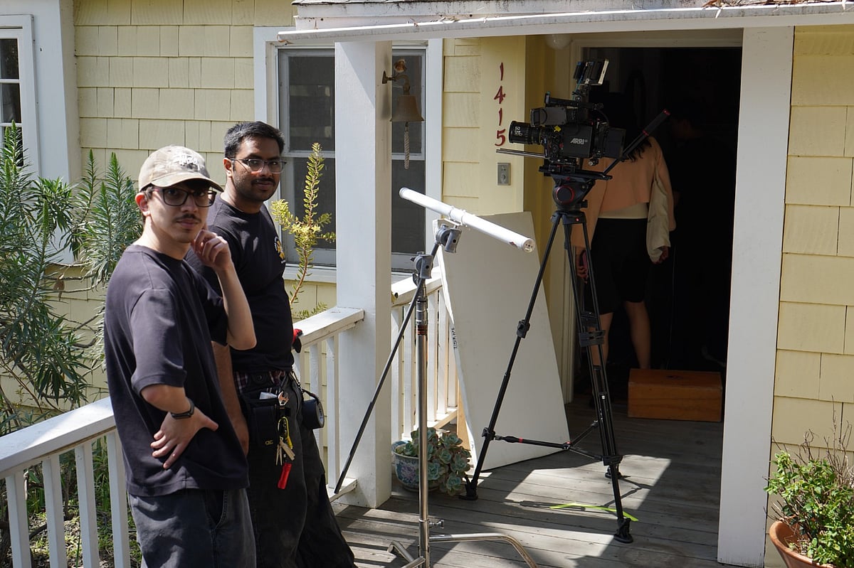 Himank Agarwal and a crew member during an outdoor film shoot