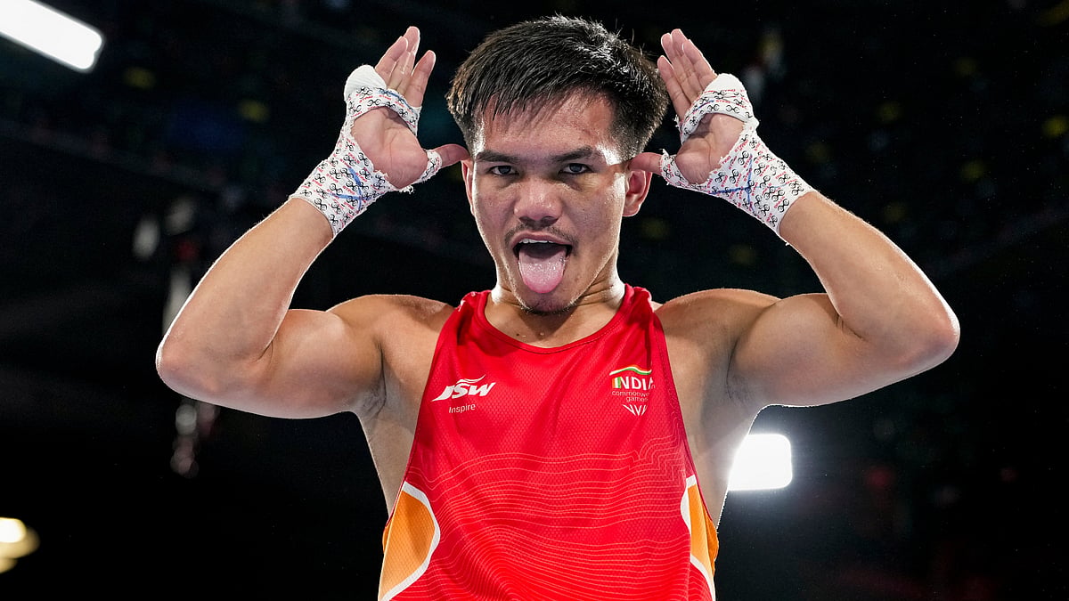 India's Jadumani Singh Mandengbam celebrates after defeating Namibia's Philip Pumulo Mutakela Haoseb in the Men's 55kg boxing semifinal at the Commonwealth Games 2026, in Glasgow, Scotland, Friday, July 31, 2026. Jadumani won the bout 5-0 to advance to the final. - PTI Photo