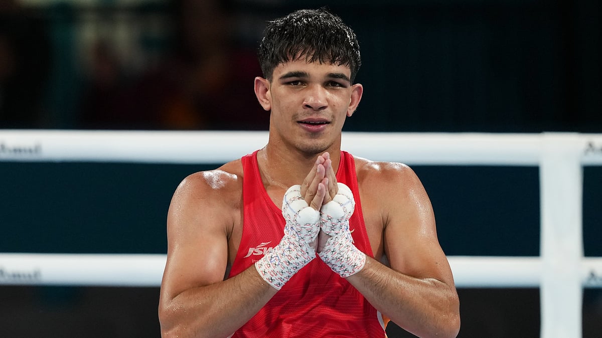 India's Ankush Panghal acknowledges the crowd after defeating Joshua Ofori of Canada in the men's 80kg light-heavyweight quarterfinal boxing bout at the Commonwealth Games in Glasgow, Scotland, Friday, July 31, 2026. - (AP Photo/Eranga Jayawardena)