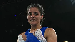 India's Sakshi Chaudhary celebrates after winning her bout with Northern Ireland's Caitlin Fryers in the women's 51kg quarterfinal at the Commonwealth Games in Glasgow, Scotland, Wednesday, July 29, 2026. - (AP Photo/Eranga Jayawardena)