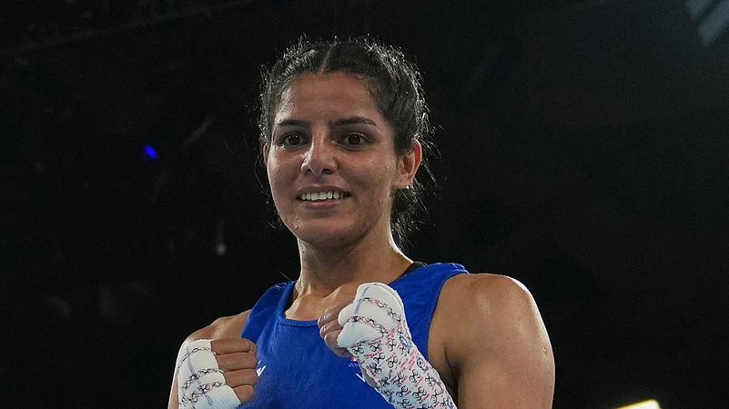Sakshi Chaudhary Glasgow Commonwealth Games 2026 womens 51kg quarterfinal win AP Photo
