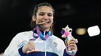 India's Golden Charge! How Day 10 Turned The Commonwealth Games Medal Table On Its Head (AP Photo/Eranga Jayawardena) : India's Arundhati Choudhary celebrates after winning the women's 70kg boxing final at the Commonwealth Games in Glasgow, Scotland, Saturday, Aug. 1, 2026