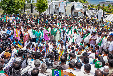 Karnataka BJP President BY Vijayendra along with party leader BS Yediyurappa, state LoP in Legislative Council Chalavadi Narayanaswamy and party workers stage a protest against the release of Cauvery water to Tamil Nadu, in Bengaluru, Friday, July 31, 2026. 