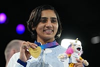 | Photo: AP/Eranga Jayawardena : Gold medalist India's Preeti Pawar celebrates after winning the women's 54kg boxing final at the Commonwealth Games in Glasgow, Scotland.