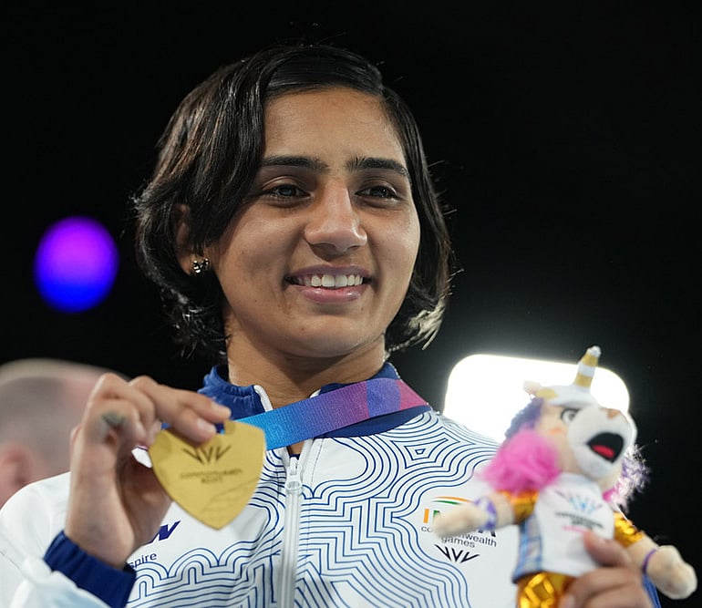 | Photo: AP/Eranga Jayawardena : Gold medalist India's Preeti Pawar celebrates after winning the women's 54kg boxing final at the Commonwealth Games in Glasgow, Scotland.