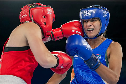 India's Jaismine Lamboria, in blue, competes against Northern Ireland's Michaela Walsh during the Women's 57kg boxing final at the Commonwealth Games 2026, in Glasgow, Scotland. Lamboria won the gold medal. 