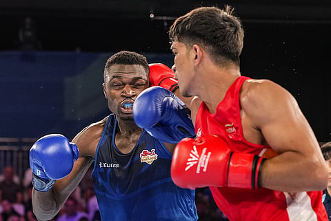 India's Ankush Panghal, in red, competes against England's Dimeji Shittu in the men's 80kg final boxing bout at the 23rd Commonwealth Games (CWG), in Glasgow, Scotland. Panghal bagged gold in the event.