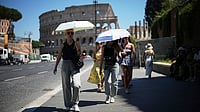 Why Is Italy Putting Nearly All Its Major Cities On The Highest 'Red' Heat Alert? | Photo: AP/Andrew Medichini : Italy has placed 23 of its 27 major cities under a maximum red heat alert for Sunday