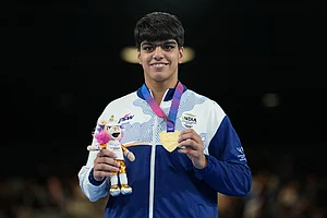 | Photo: AP/Eranga Jayawardena : India's Priya Ghanghas celebrates after winning the women's 60kg boxing final at the Commonwealth Games in Glasgow, Scotland.