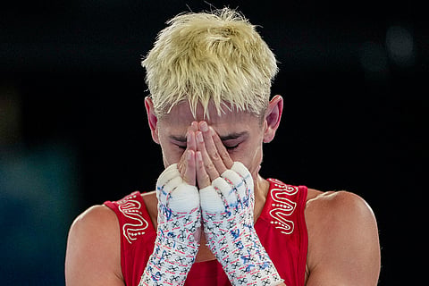 Australia's Jye Dixon reacts after winning against India's Jadumani Singh during the men's 55kg boxing final at the Commonwealth Games 2026, in Glasgow, Scotland. Singh bagged a silver medal. 