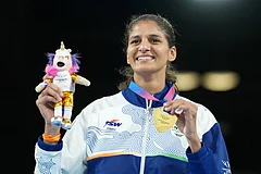 India's Jaismine Lamboria celebrates after winning the women's 57kg boxing final at the Commonwealth Games in Glasgow, Scotland. - | Photo: AP/Eranga Jayawardena