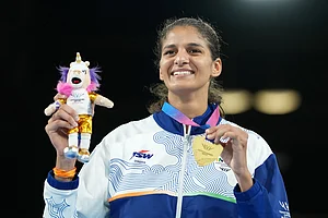 | Photo: AP/Eranga Jayawardena : India's Jaismine Lamboria celebrates after winning the women's 57kg boxing final at the Commonwealth Games in Glasgow, Scotland.