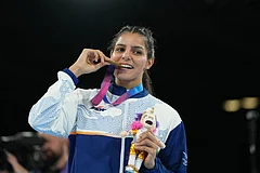 India's Sakshi Chaudhary, celebrates after winning the women's 51kg boxing final at the Commonwealth Games in Glasgow, Scotland. - | Photo: AP/Eranga Jayawardena