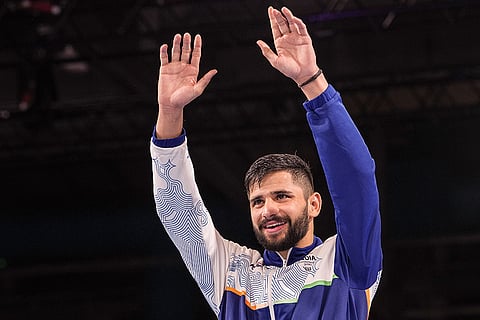 Gold medallist India's Sachin Siwach during the presentation ceremony after the men's 60kg final boxing event at the 23rd Commonwealth Games (CWG), in Glasgow, Scotland.