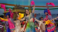 Indian performers dance during the closing ceremony for Commonwealth Games in Glasgow, Scotland, Sunday, Aug. 2, 2026, India is due to hold the Commonwealth games in 2030 - (AP Photo/Kin Cheung)