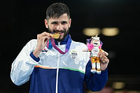 Sachin Siwach Stages Dramatic Comeback To Win Men’s 60kg Boxing Gold At Commonwealth Games 2026 | Photo: AP/Eranga Jayawardena : India's Sachin Sachin celebrates after winning the men's 60kg boxing final at the Commonwealth Games in Glasgow, Scotland.