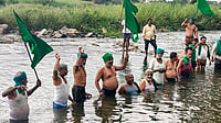 After Cauvery Outreach, TVK Minister Targets Karnataka CM: 'He Listens Only to Stalin, Not Congress Leadership' | Photo: PTI : People stage a protest over the CWMA upholding the CWRC order to release 3,500 cusecs of Cauvery water daily to Tamil Nadu for the next 15 days, in Mandya, Karnataka, Thursday, July 30, 2026.