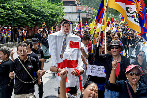Members of the Tibetan community hold a protest march over the self-immolation of activist Lobsang Palden, widely known as Lobga Rangzen in New York last month, in Dehradun.