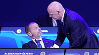 AP Photo/Fernando Calistro, File : FIFA President Gianni Infantino, right, talks to UEFA President Aleksander Ceferin during the FIFA 75th Congress at the Conmebol Convention Center in Luque.