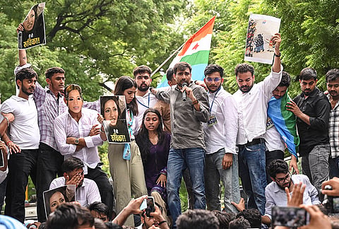 National Students' Union of India (NSUI) President Vinod Jakhar and others stage a "Students' Justice March" towards the Jantar Mantar to protest the police action, including the use of pellet guns, against students during the July 20 "Sansad Chalo" march, demanding the resignation of Union Home Minister Amit Shah, in New Delhi.