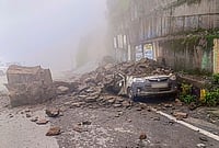 Day In Pics: August 03, 2026 | Photo: PTI : A car lies crushed under boulders after a landslide triggered by heavy monsoon rains at Theog, in Shimla district, Monday, Aug. 3, 2026.