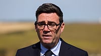 Jack Taylor/Pool Photo via AP : Britain's Prime Minister Andy Burnham speaks to the media during a visit to HM Coastguard Maritime Rescue Coordination Centre, in Dover, Britain.