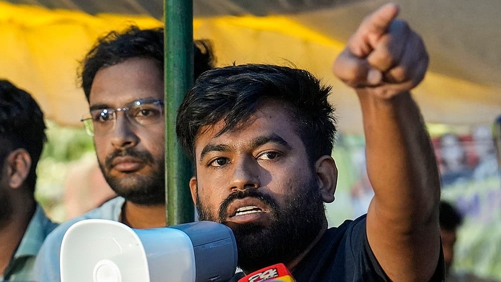 Cockroach Janta Party (CJP) founder Abhijeet Dipke addresses supporters  - | Photo: PTI/Salman Ali