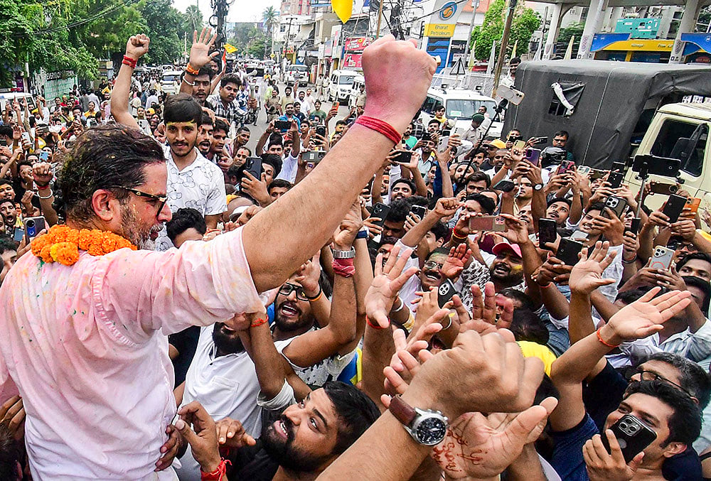 Jan Suraaj Party chief Prashant Kishor celebrates with supporters after taking the lead in the Bankipur Assembly by-election during the counting of votes, in Patna. - | Photo: PTI