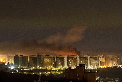 Smoke rises over the city center of Kyiv, Ukraine, after a Russian missile attack Saturday, Aug. 1, 2026. 