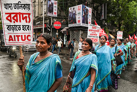Members of ICDS, ASHA and Mid-Day Meal workers' organisations participate in a rally demanding higher wages, government employee status and other benefits, in Kolkata.