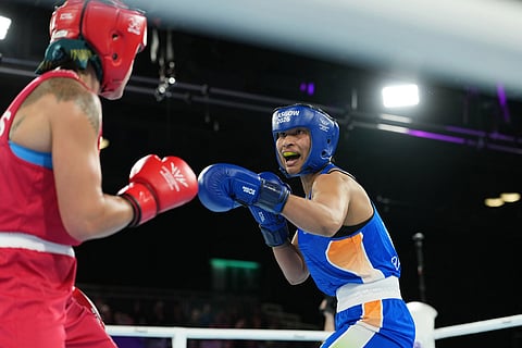India's Lovlina Borgohain, right, competes with Australia's Emma-Sue Greentree in the women's 75kg boxing final at the Commonwealth Games in Glasgow, Scotland.