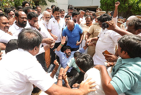 DMK supporters stage a protest after former Tamil Nadu deputy chief minister Udhayanidhi Stalin being arrested for alleged "double-meaning" remark alluding to popular actor Trisha and insulting her modesty, in Chennai, Tuesday, Aug. 4, 2026. 