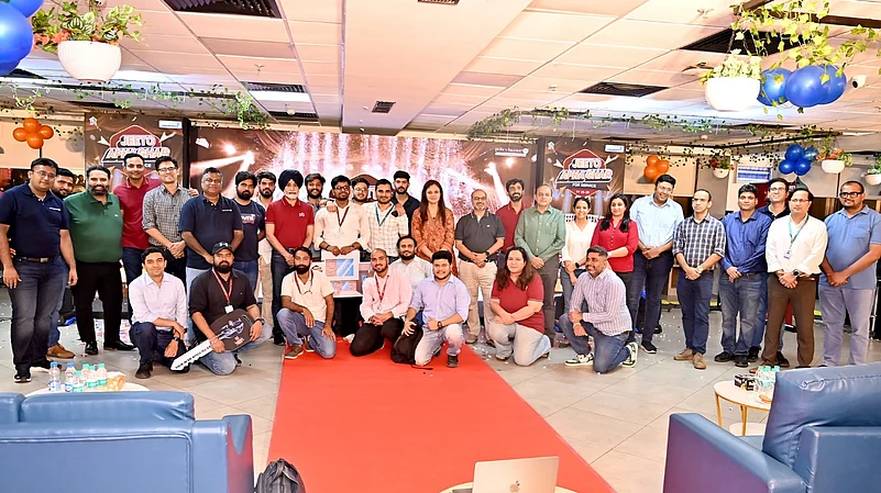 Group photo of team celebrating at corporate event