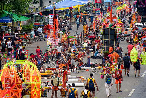 'Kanwariyas' take out a 'Kanwar Yatra' procession carrying Ganga water to offer prayers to Lord Shiva during the holy month of 'Sawan', in Haridwar, Uttarakhand.