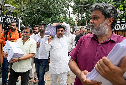Demonstrators at AAP office during a protest march by party national convener Arvind Kejriwal to the Prime Minister’s residence to submit petitions against E20 fuel, alleging the centre is promoting it under pressure from US President Donald Trump, in New Delhi, Tuesday, Aug. 4, 2026. 