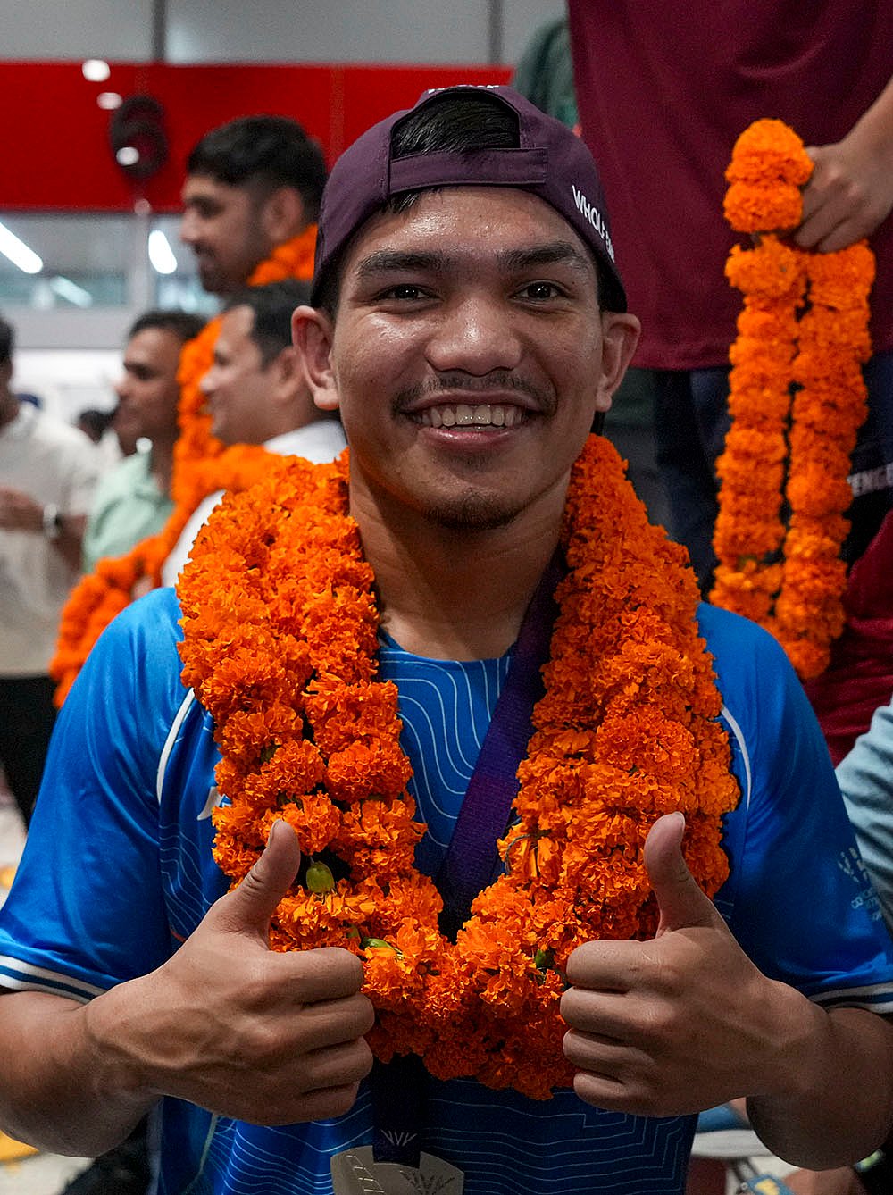 Indian athletes return home Boxing silver medallist Jadumani Singh Mandengbam
