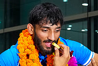 | Photo: PTI/Atul Yadav : Judo gold medallist Harsh Singh being welcomed on his arrival after the Glasgow Commonwealth Games, at IGI Airport in New Delhi, early Tuesday, Aug. 4, 2026. 