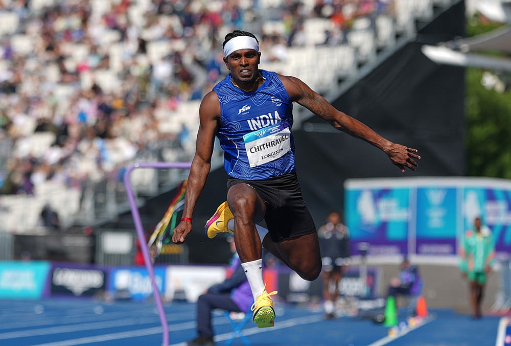 Indias Praveen Chithravel competes in the mens triple jump final