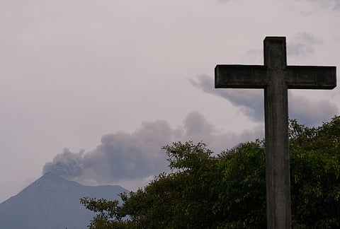 Clouds of ash spew from crater of the Fuego volcano, as seen from San Pedro Las Huertas, Guatemala, Tuesday, Aug. 4, 2026. 