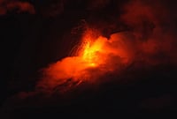 In Photos: Stunning Visuals From Fuego Volcano Eruption, Thousands Evacuated | Photo: AP/Moises Castillo : Lava flows out of the crater of the Fuego Volcano, as seen from San Juan Alotenango, Guatemala, Tuesday, Aug. 4, 2026.