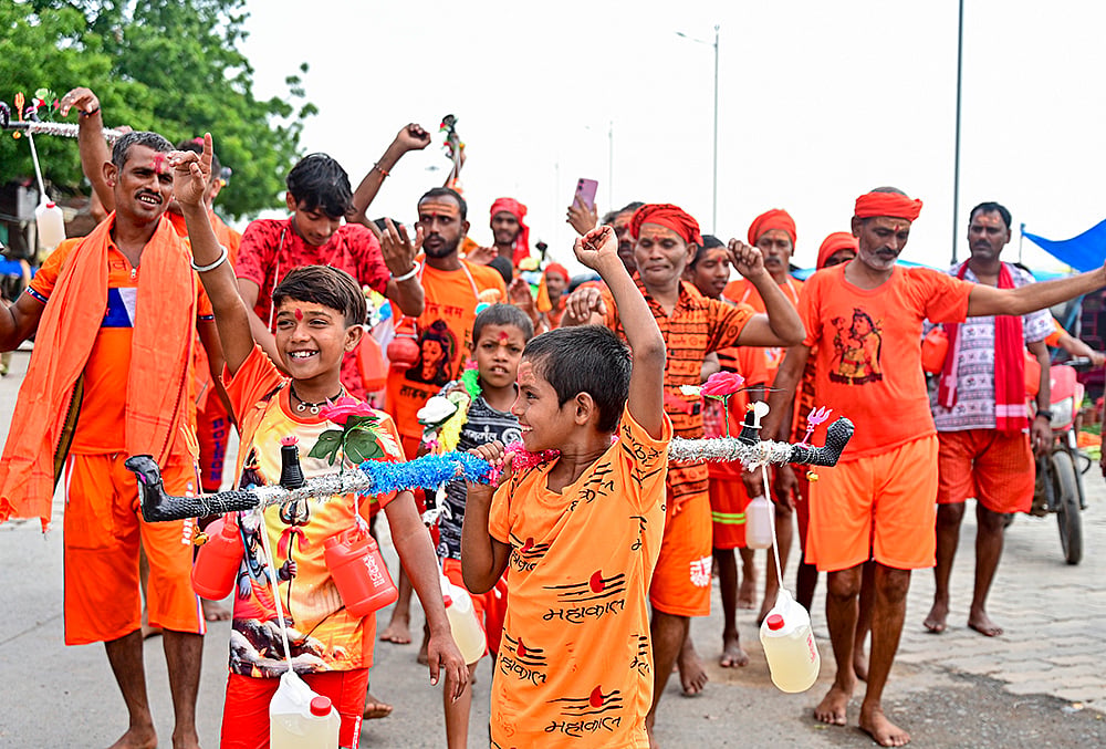 Saffron-clad Shiva devotees
