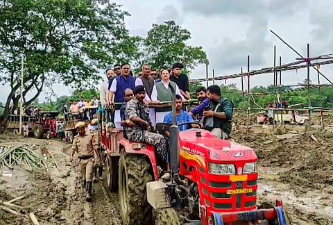 Union Health and Family Welfare Minister JP Nadda along with Assam Chief Minister Himanta Biswa Sarma and others rides a tractor-trailer to visit flood-affected areas in Bihubor Nepali Khuti, Sivasagar district. Nadda visited the region to inspect the ground situation and review relief operations in the deluge-hit state. 