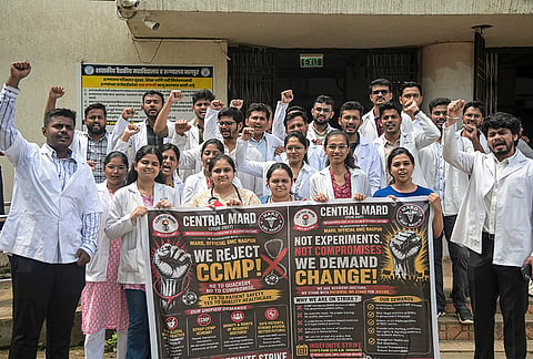 Resident doctors affiliated with Central MARD hold banners and shout slogans outside the Government Medical College & Hospital (GMCH) during an indefinite strike, in Nagpur. Protesting doctors are demanding the cancellation of the CCMP course allowing BHMS practitioners to prescribe allopathic medicine. 