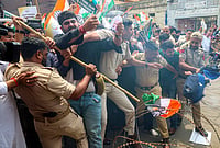 In Photos: Opposition Parties Protest On The 7th Anniversary Of Article 370's Abrogation | Photo: PTI : Police stop Congress workers during a protest on the seventh anniversary of the abrogation of Article 370, demanding the restoration of the special status of the erstwhile state of J-K, in Jammu, Wednesday, Aug. 5, 2026.