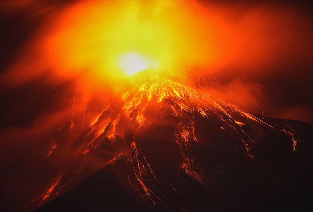 Lava flows out of the crater of the Fuego Volcano, as seen from San Juan Alotenango, Guatemala, Tuesday, Aug. 4, 2026. 