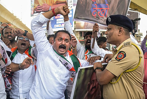 Nationalist Congress Party (NCP) workers during a protest condemning alleged derogatory remarks made by MPCC President Harshvardhan Sapkal against Maharashtra Deputy Chief Minister Sunetra Pawar, in Nagpur.