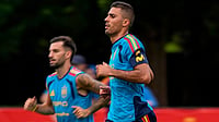 | Photo: AP/Mike Stewart : Spain's Rodri, right, works out with the team during a training session, in Chattanooga, Tennessee ahead of the World Cup soccer tournament. 