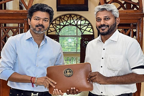 In this image posted on Aug. 6, 2026, Tamil Nadu Chief Minister Joseph Vijay with state Finance, Planning, and Development N Marie Wilson after presenting the Revised Budget Estimates for 2026-27 at the state Legislative Assembly, in Chennai.