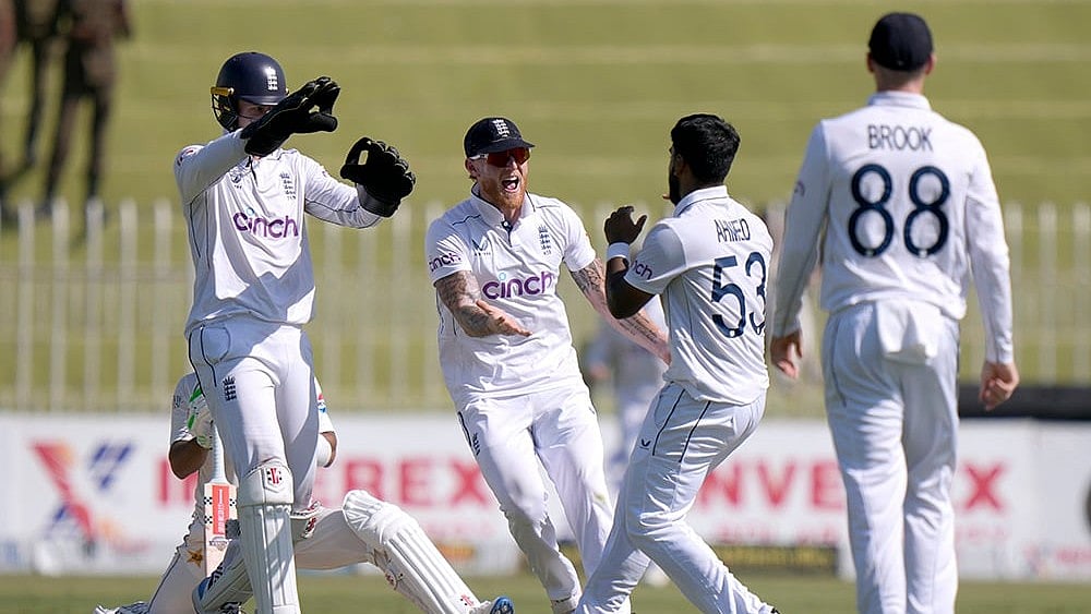 Pakistan vs England 3rd Test: England's Rehan Ahmed celebrates with teammates after taking the wicket of Pakistan's Mohammad Rizwan - | Photo: AP/Anjum Naveed