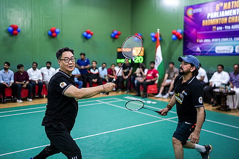 Union Minister Kiren Rijiju and BJP MP Anurag Thakur compete in the inaugural match of the sixth National Parliamentarians Badminton Championship, at OP Jindal Sports Complex, in New Delhi.